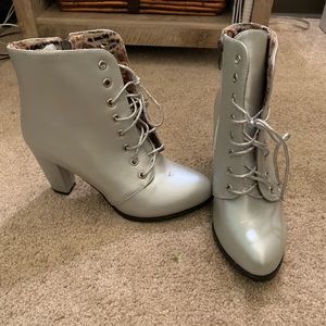 Brand new never been worn silver heeled boots